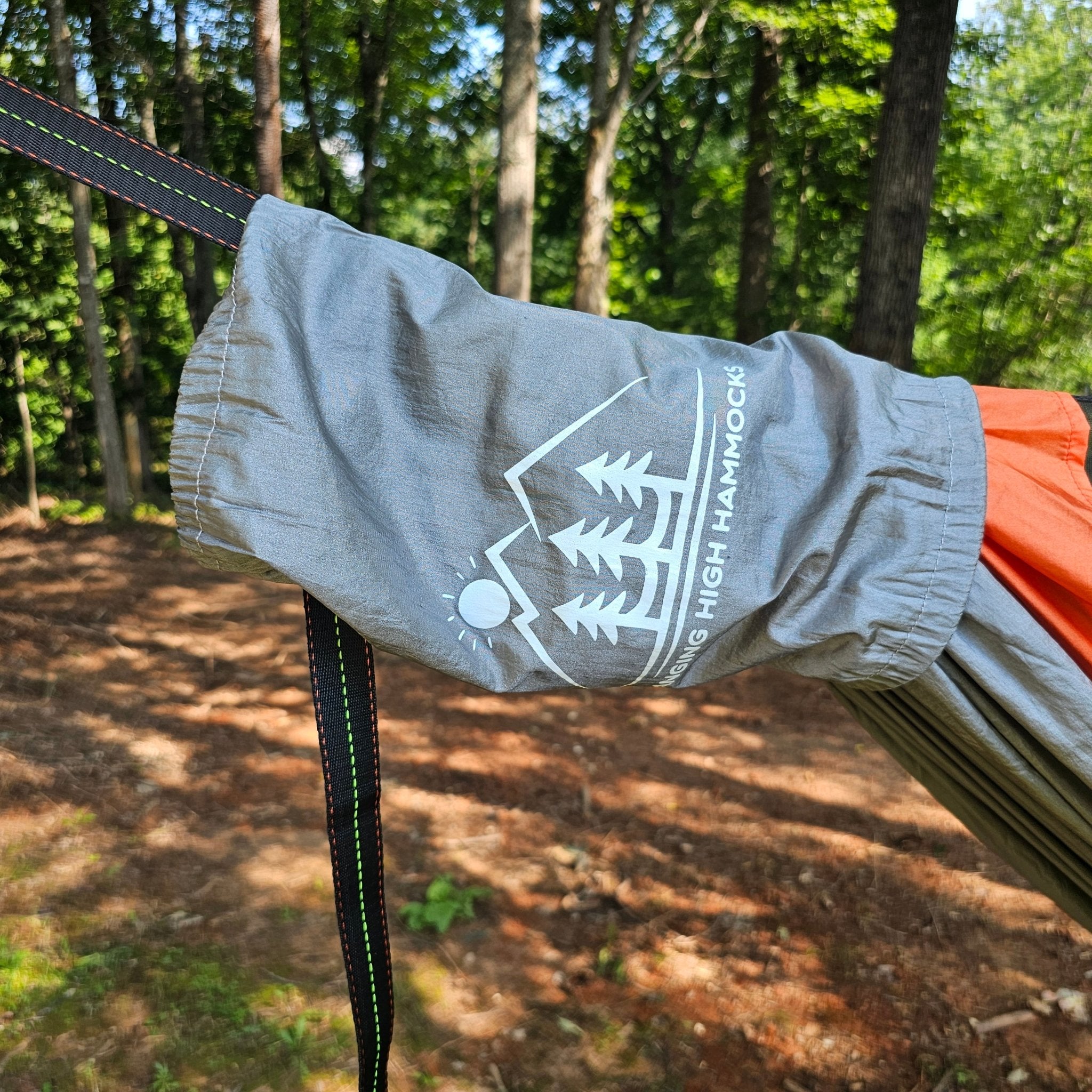 Hanging High Hammocks REM Hammock complete sleep system with bug net, ridgeline organizer, underquilt clips, and straps for camping.