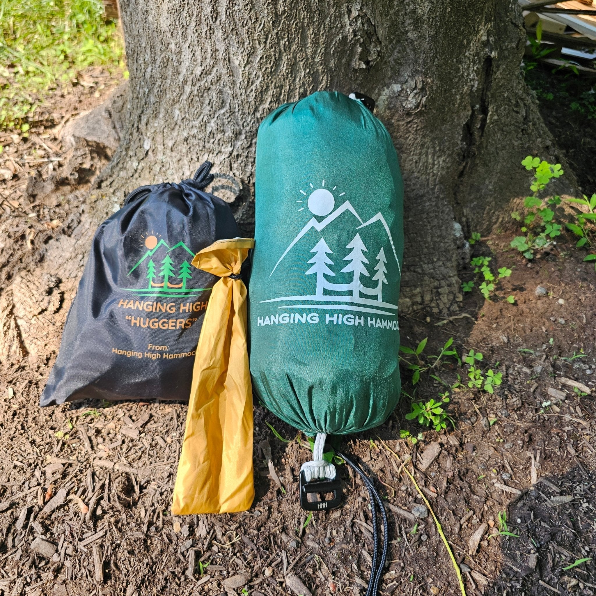 Hanging High Hammocks REM Hammock Complete Sleep System with bug net, cinch buckles, underquilt, and straps for camping comfort.