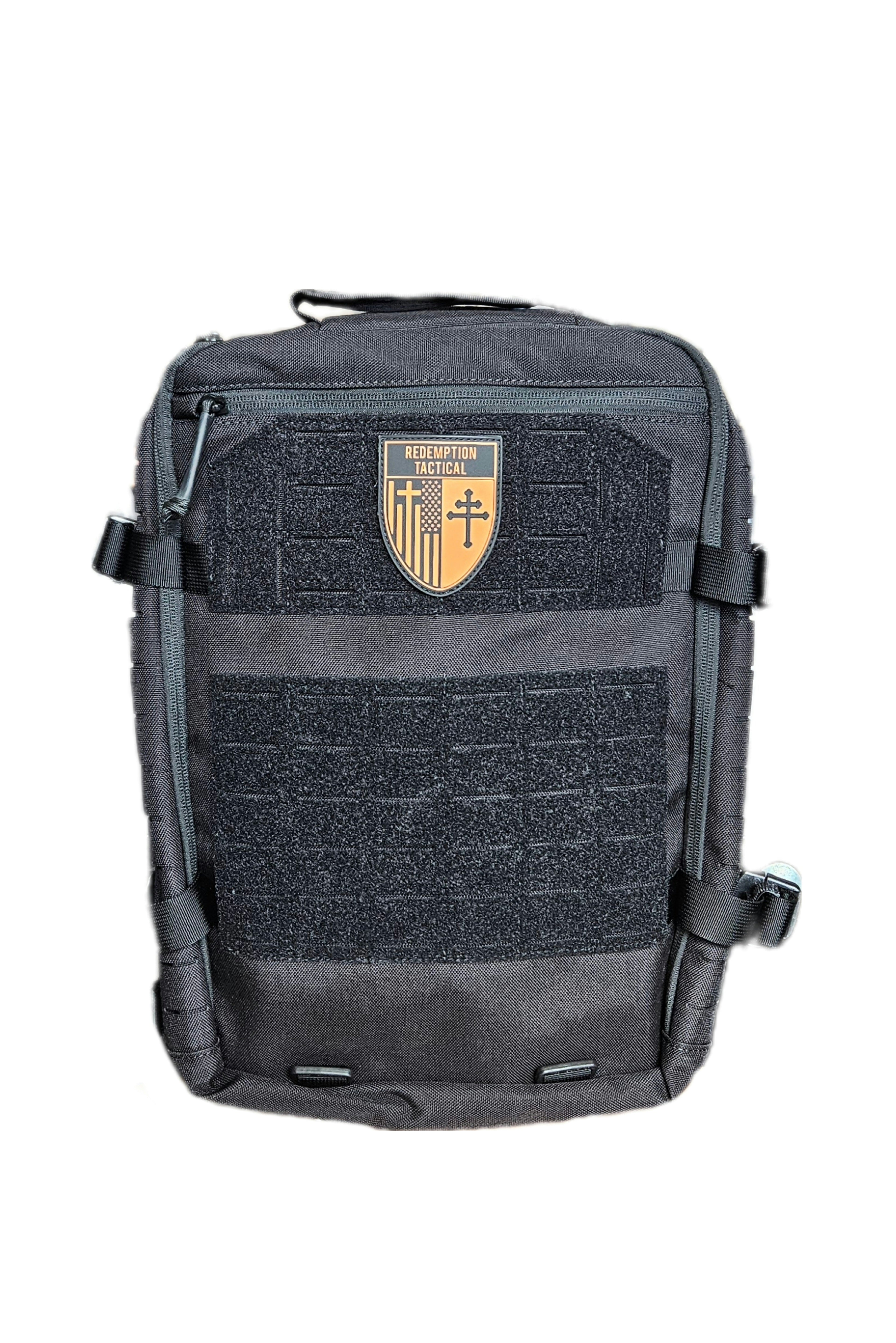 Redemption Tactical Crusader Flatpack Plate Carrier Bag in a tactical setting, showcasing its durable design and storage features.