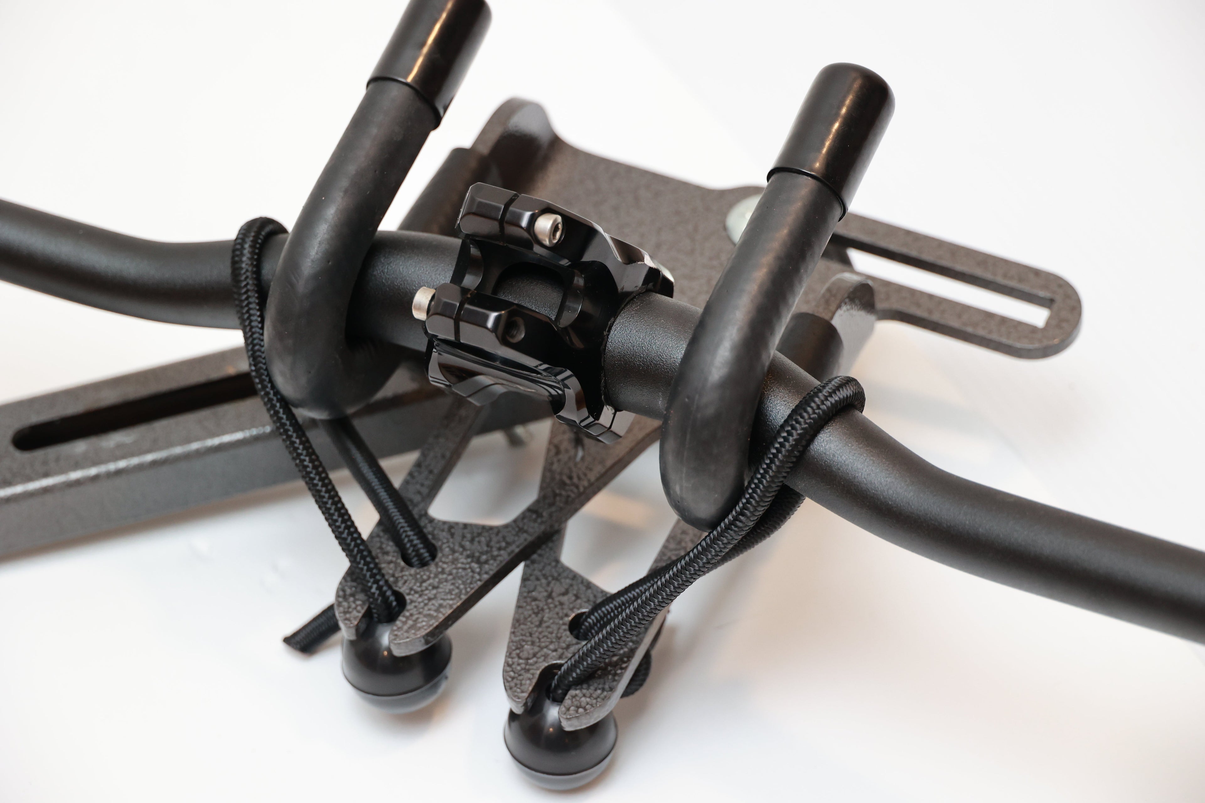 Lolo Racks DH Bike and E-Bike compatible attachment carrier mounted on a bicycle frame, showcasing DIY rack accessory for bike transport.