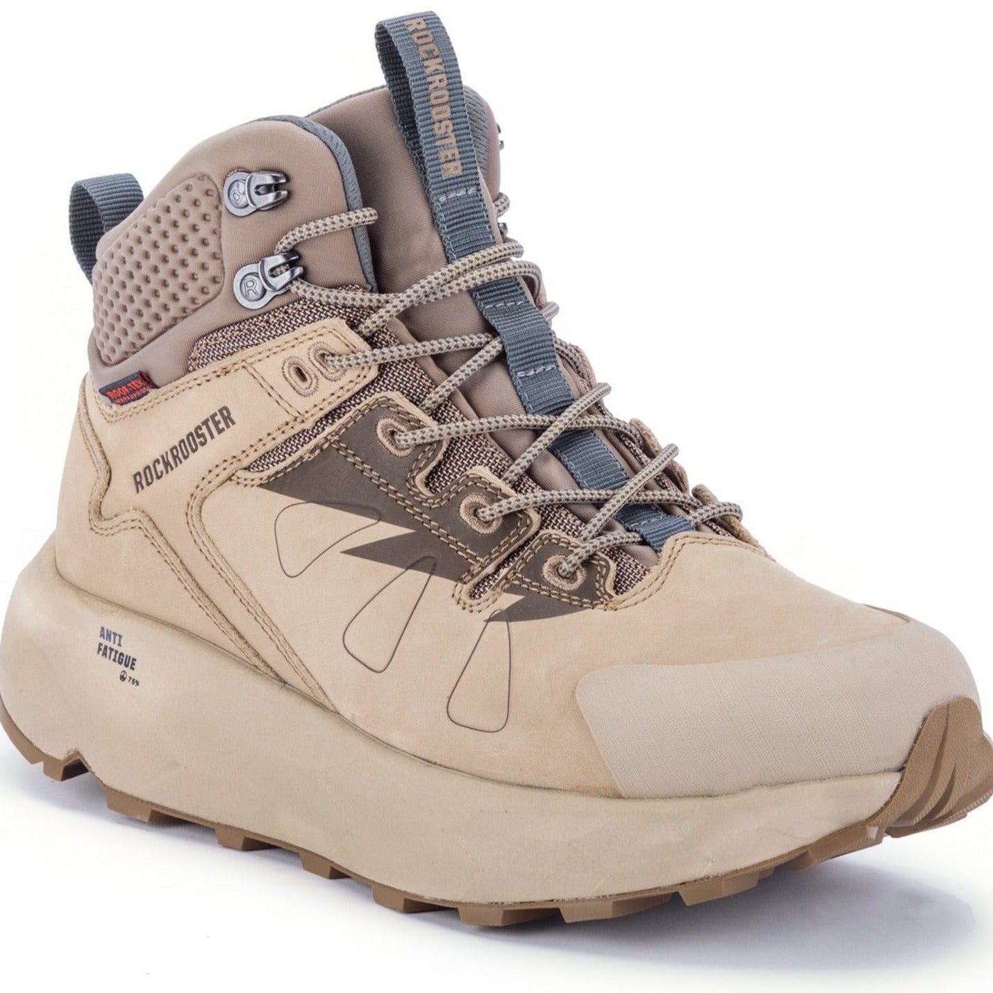 Rock Rooster Farmington Sand waterproof hiking boots with 6-inch ankle height and VIBRAM® outsole, shown on a rugged trail.