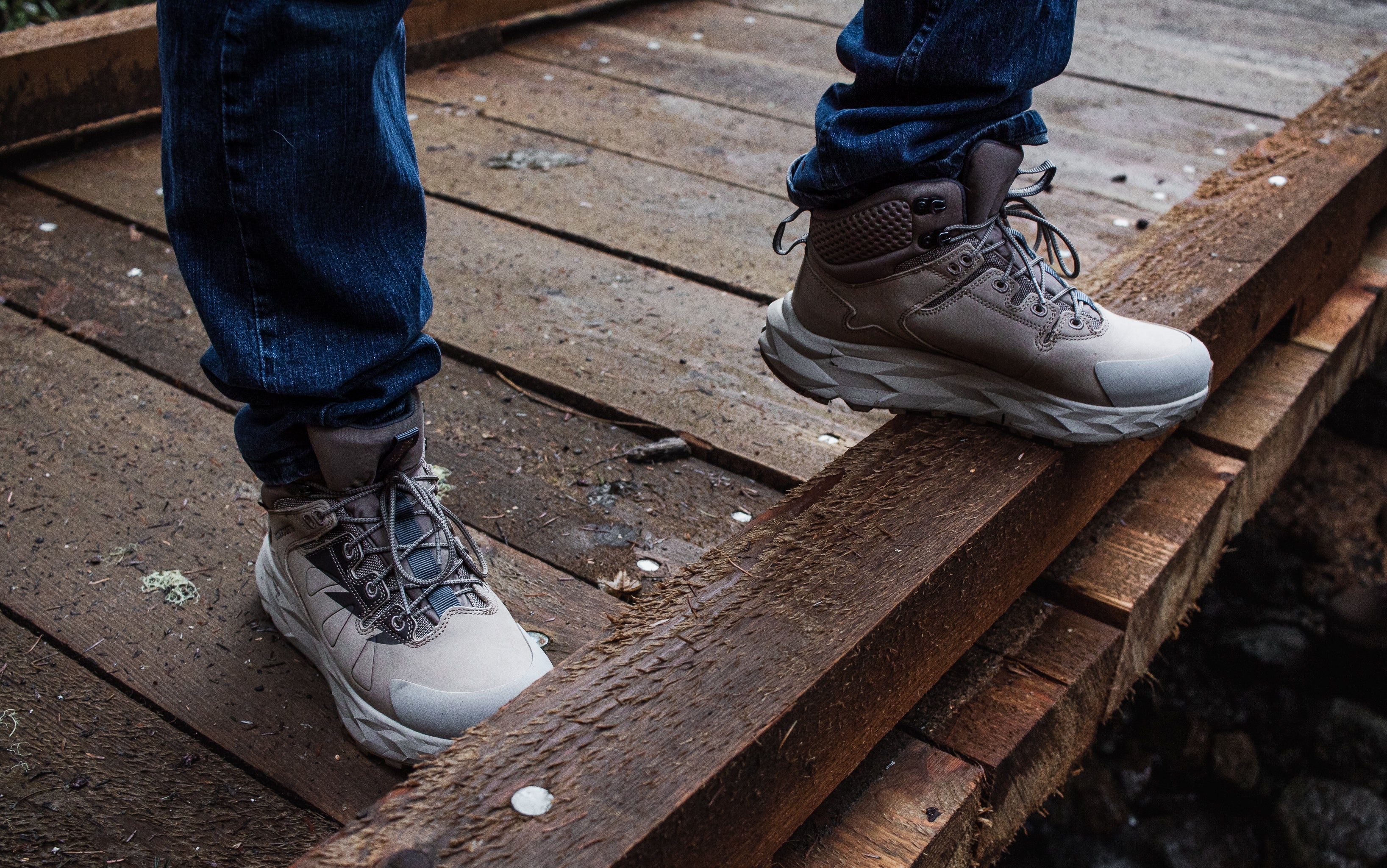 Rock Rooster Farmington Sand waterproof hiking boots with 6-inch shaft and VIBRAM® outsole, shown in rugged outdoor setting.