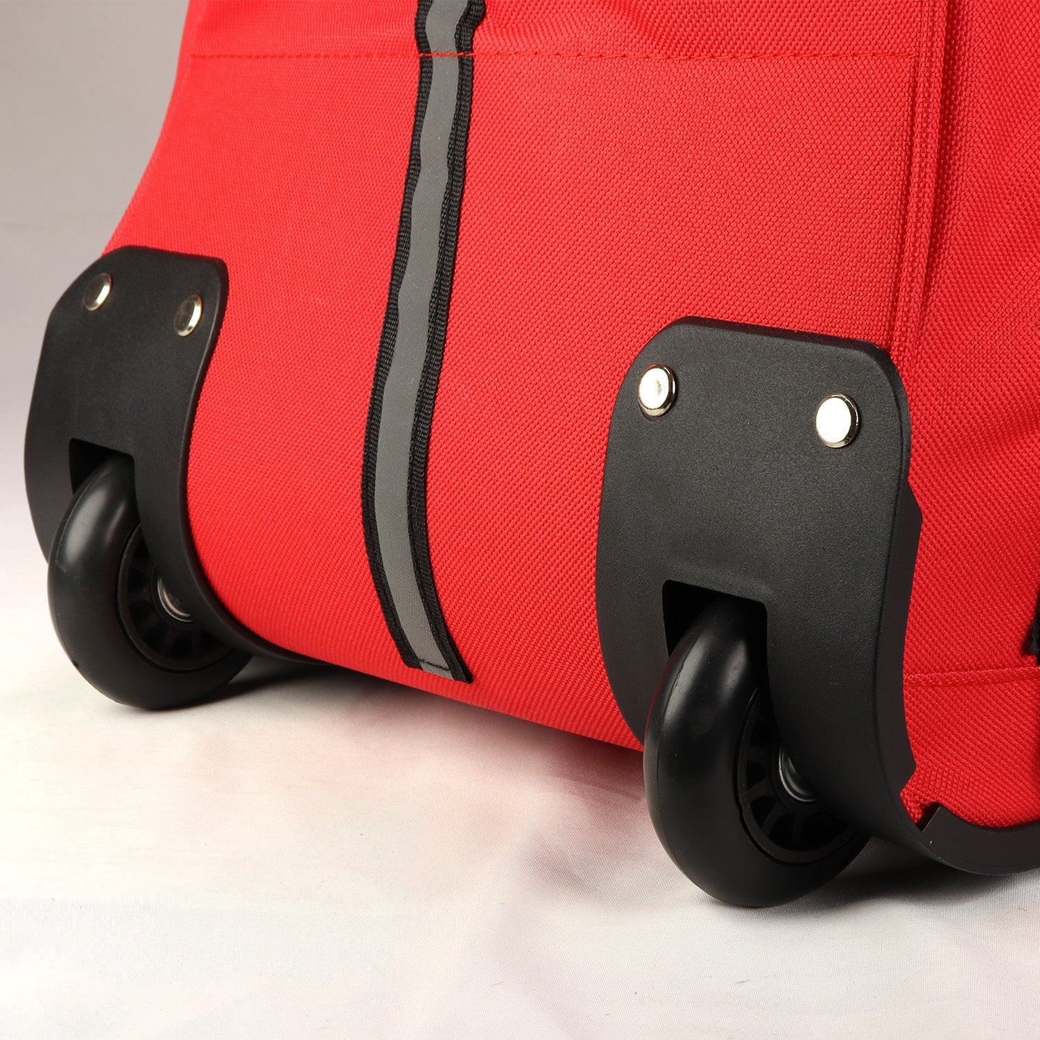 Durable rolling duffel bag with telescoping handle, made of 600D fabric, ideal for travel, camping, or bug-out gear storage.