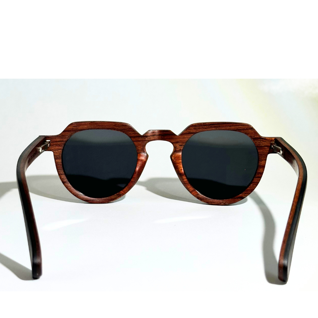 Eastern Outer Wallsburg round sunglasses with wood and carbon fiber frames, showing the rear view of the stylish eyewear.