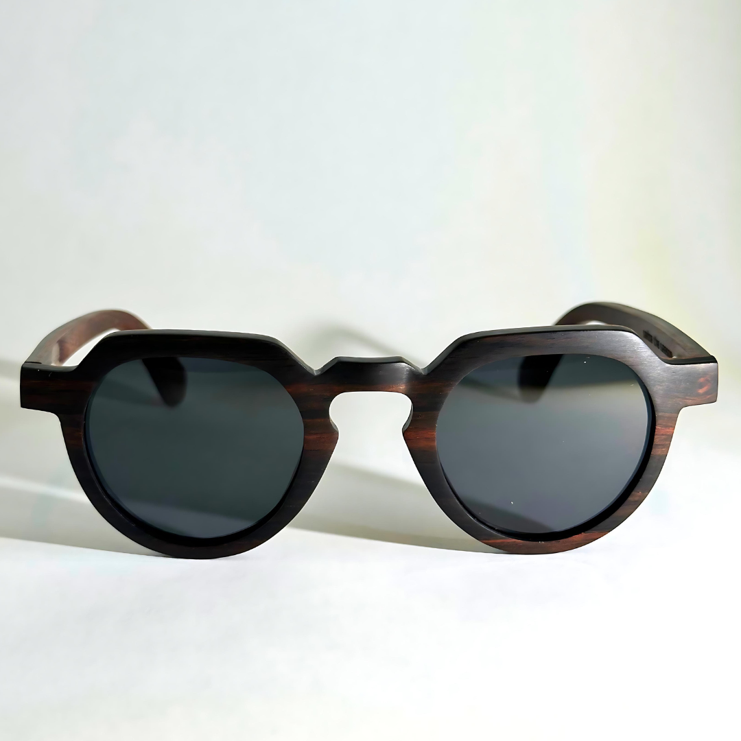 Eastern Outer Wallsburg sunglasses with round wood and carbon fiber frames, showcasing a sleek and stylish design.