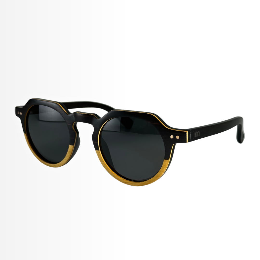 Eastern Outer Wallsburg sunglasses with round yellow lenses and carbon fiber arms, stylish and lightweight eyewear for everyday wear.