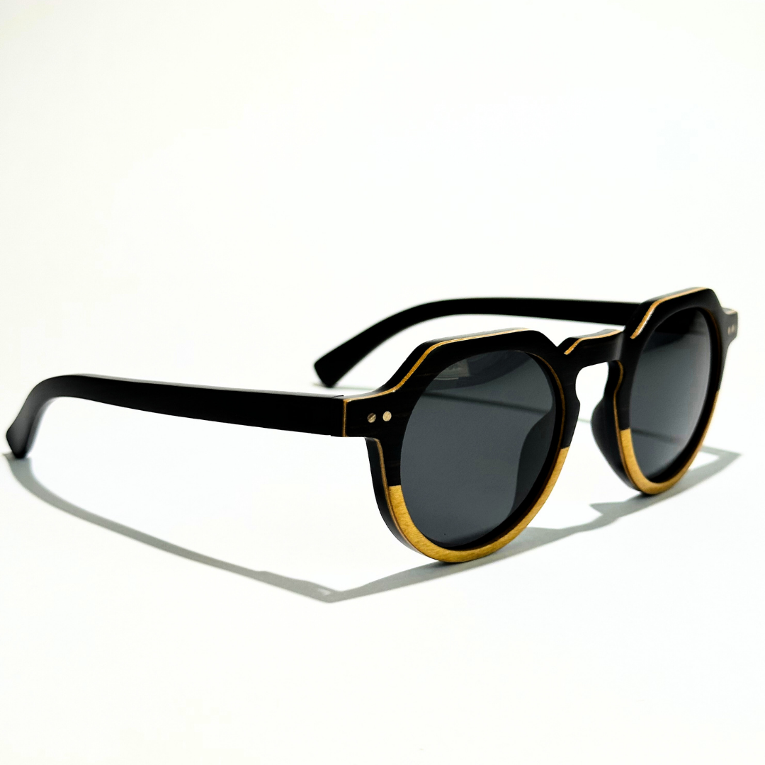 Eastern Outer Wallsburg sunglasses with round yellow-tinted lenses and carbon fiber frames, stylish and lightweight eyewear.