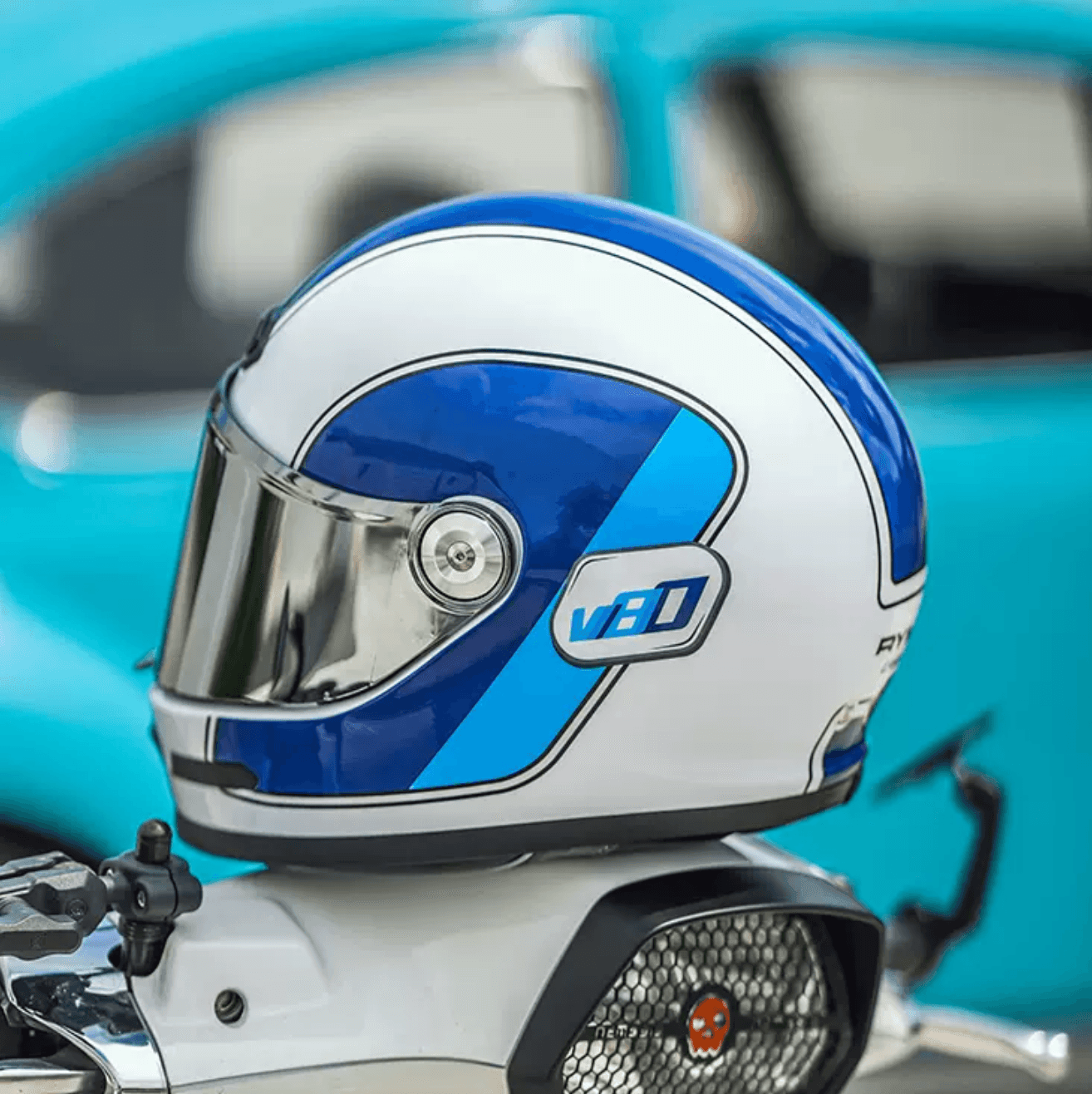 RYMIC™ V80 full face helmet in black with clear visor, designed for motorcycle riders, featuring a sleek aerodynamic shape.