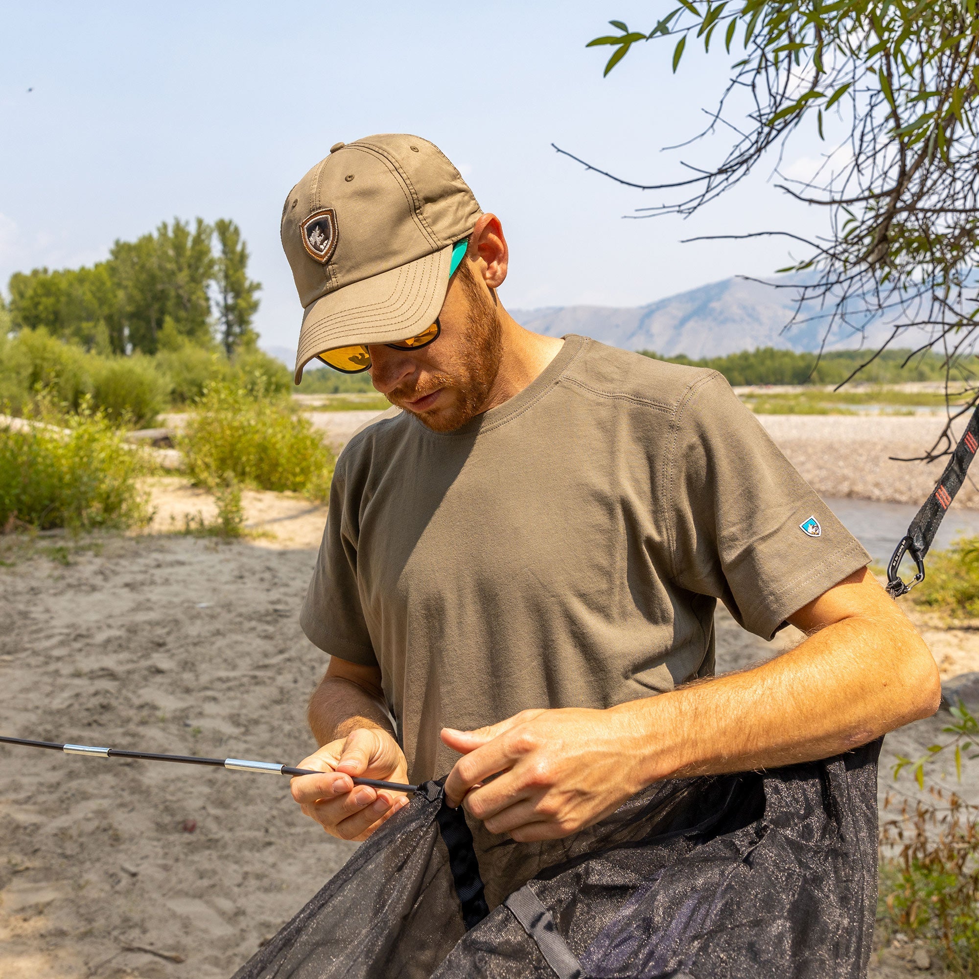GrandTrunk Skeeter Beeter XT mosquito net hammock set up outdoors, showcasing breathable netting and a comfortable design.