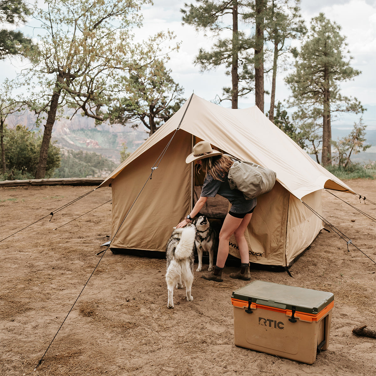 White Duck Outdoors Rover Scout Tent set up outdoors for adventure, showcasing durable fabric and spacious design for camping.