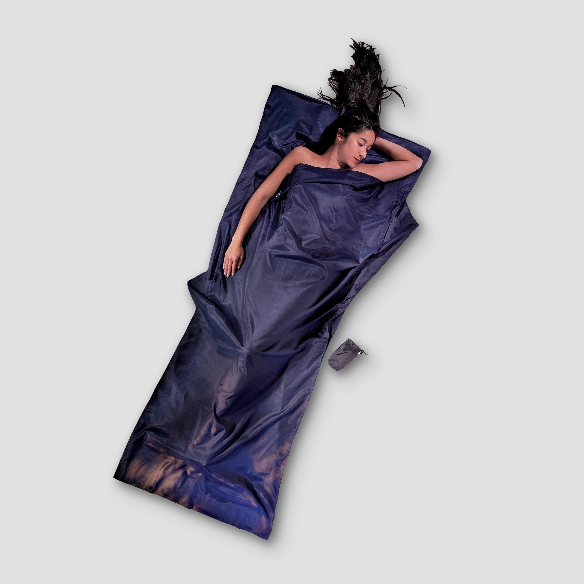 COCOON TravelSheet™ made of silk Egyptian cotton, showcasing its smooth texture and elegant design for travel comfort.