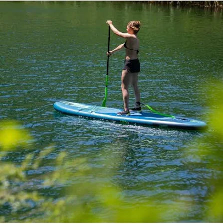 Backcountry Sportsman Yarra 10.6 Package inflatable kayak in steel blue, shown deflated with accessories visible.