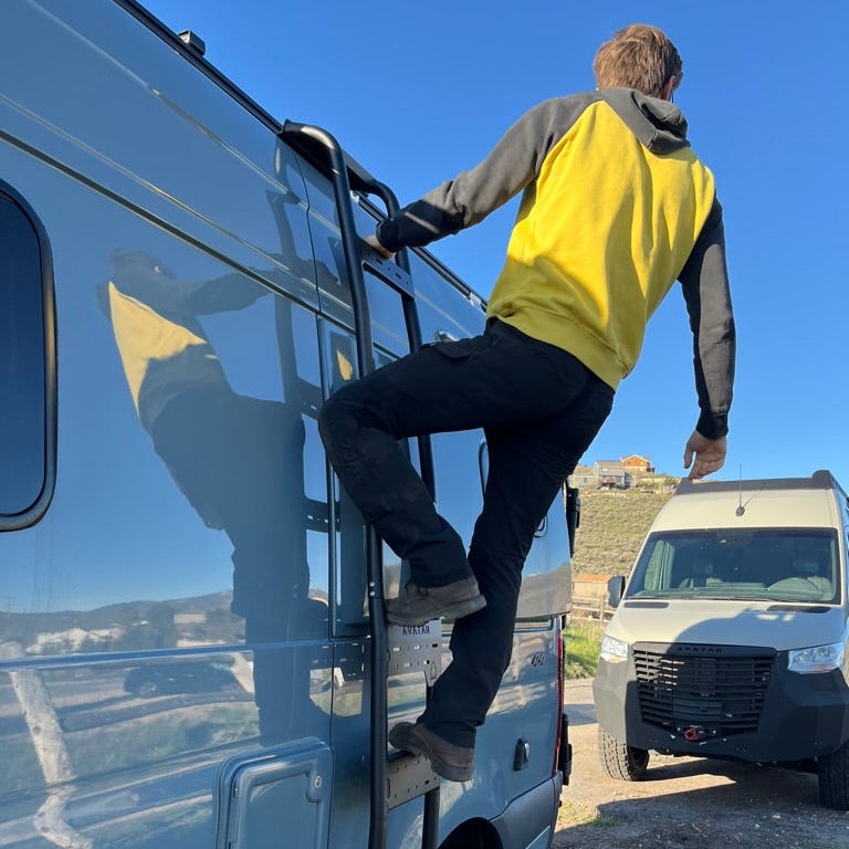 Mercedes Sprinter Van side ladder by Avatar Offroad, custom design, mounted on the side of the van for easy access.