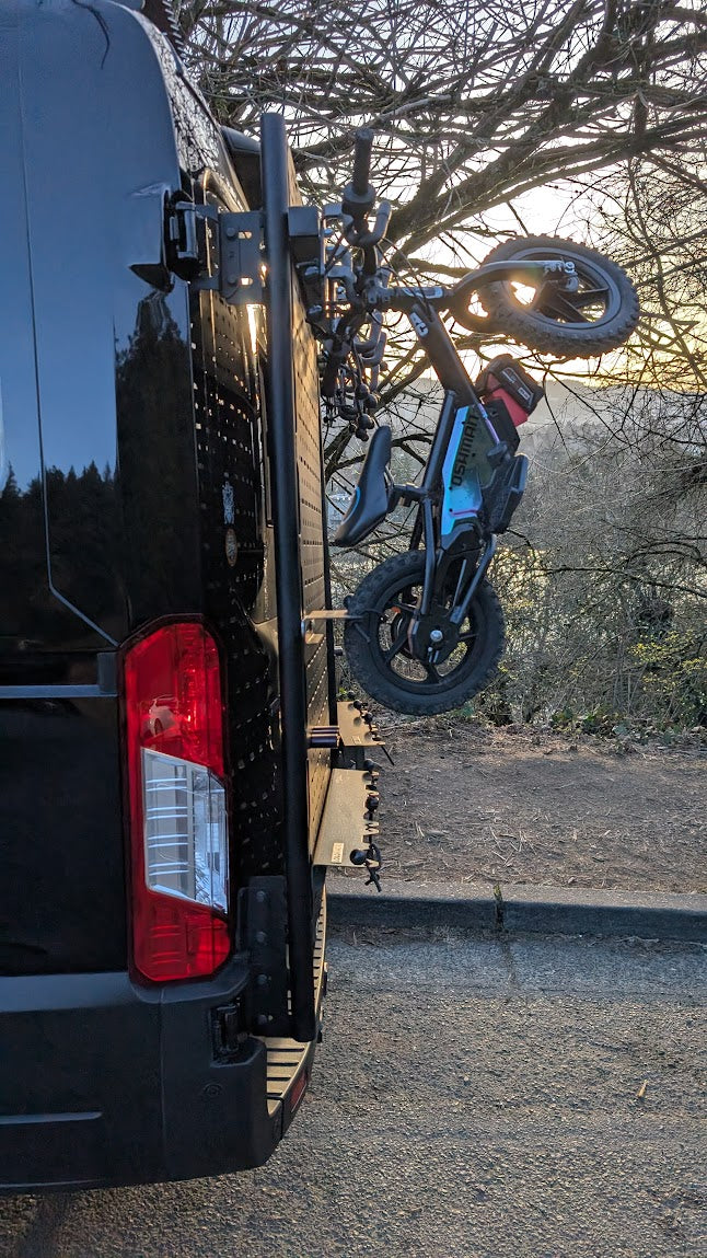 Lolo Racks DIY bike rack accessory showing a single rear tire mount for Stacyc bikes, designed for easy rear wheel attachment.