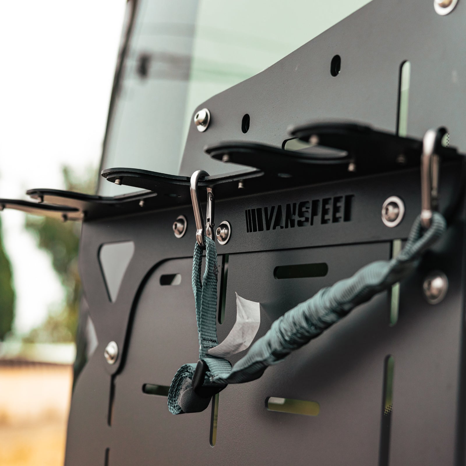 Vanspeed Sprinter Gondola Rack Bundle installed on a van, with green ski box mounted on the exterior, part of Vanspeed exterior parts.