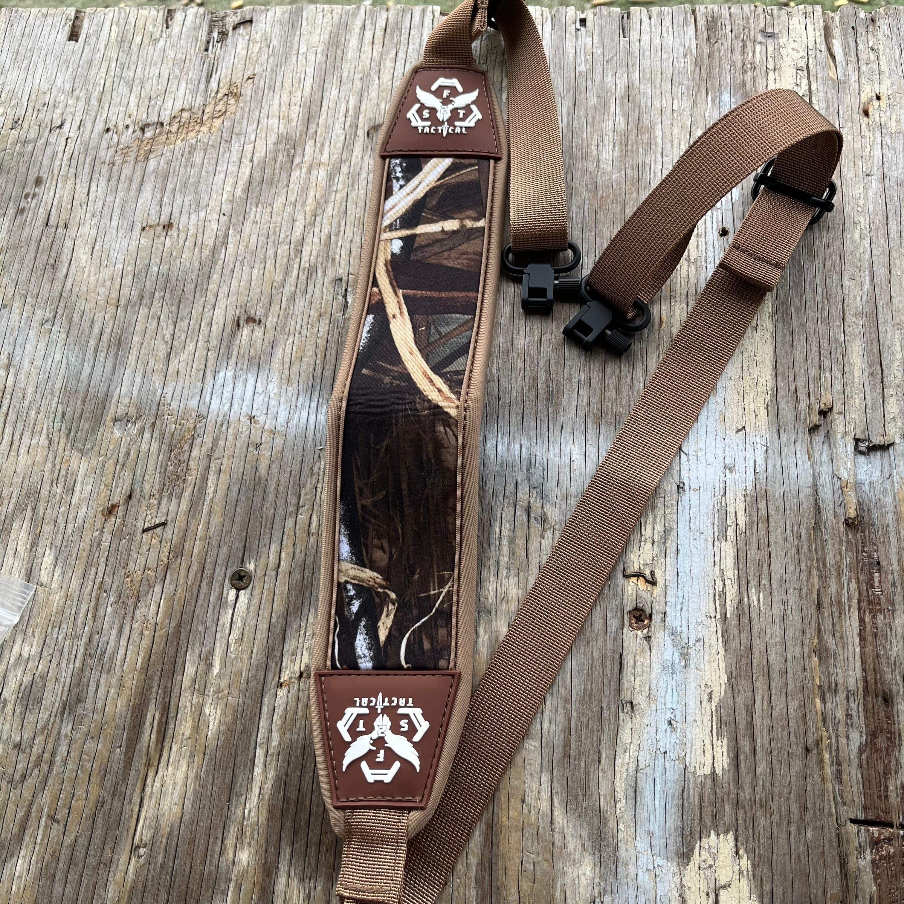 SFT2 Tactical hunting sling with adjustable straps, designed for secure firearm carrying during outdoor hunting activities.