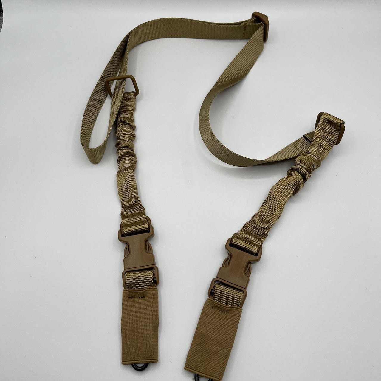 SFT2 Tactical tan single point bungee sling, featuring adjustable bungee for comfort and stability in tactical use.