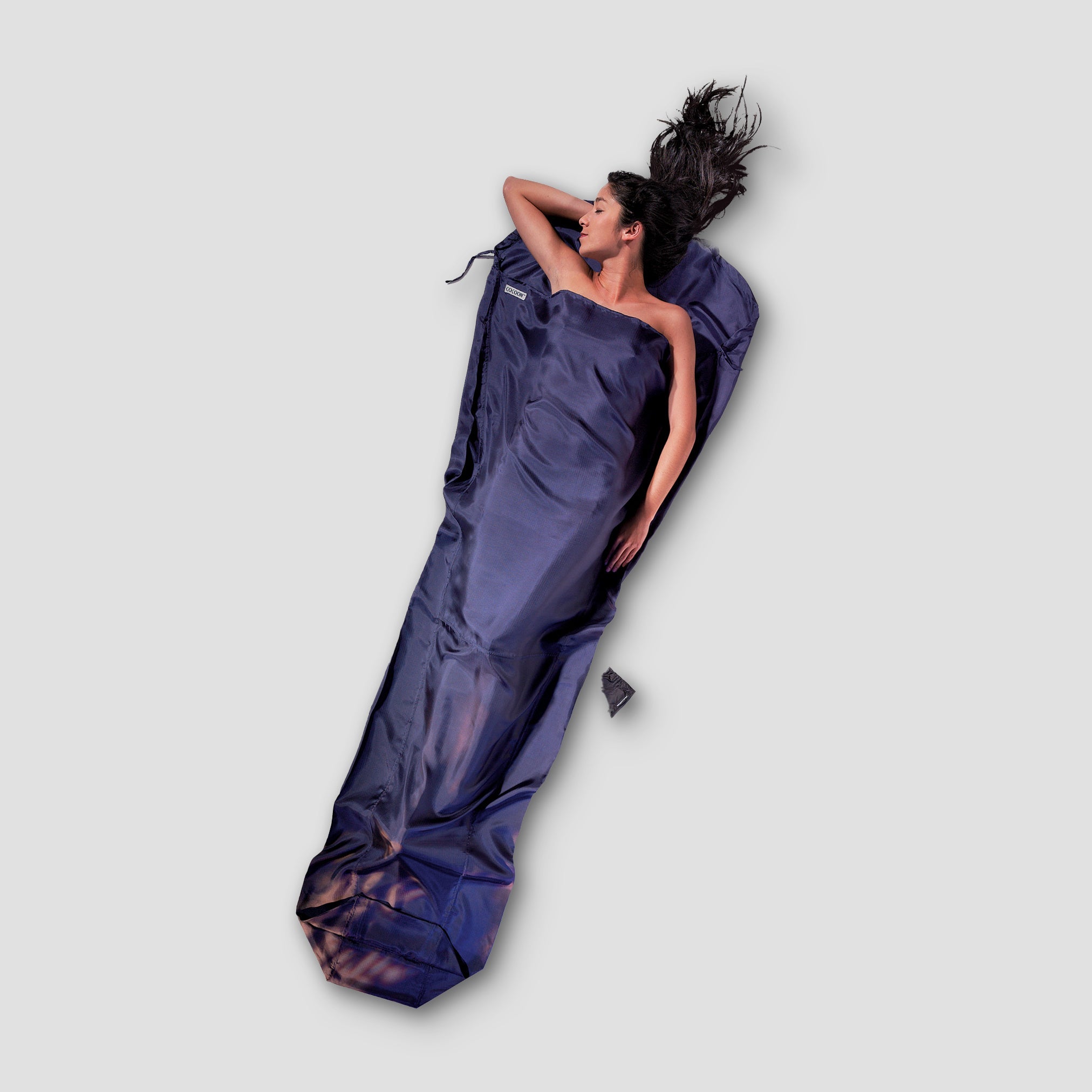 COCOON MummyLiner™ in RipStop Silk, showcasing its lightweight fabric and smooth texture for sleeping bags.