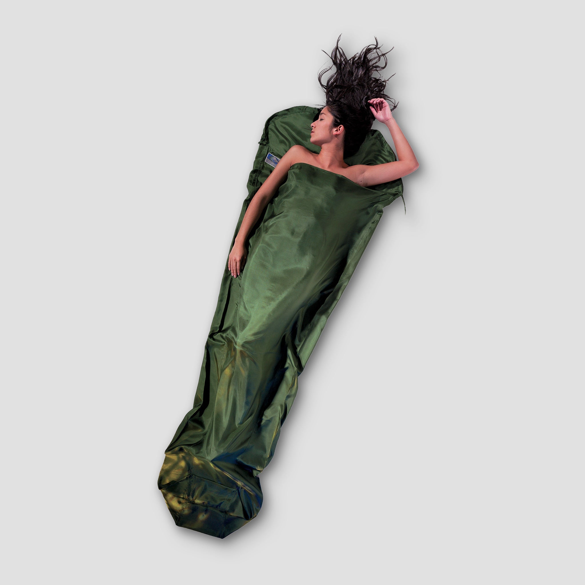 Soft COCOON MummyLiner™ Silk sleeping bag liner in luxurious silk fabric, ideal for added comfort while camping.
