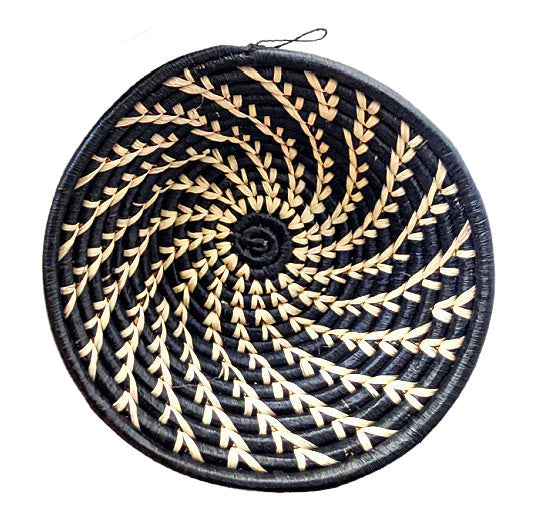 Small black woven Raffia African basket by Reflektion Design, showcasing intricate handwoven texture and compact size.