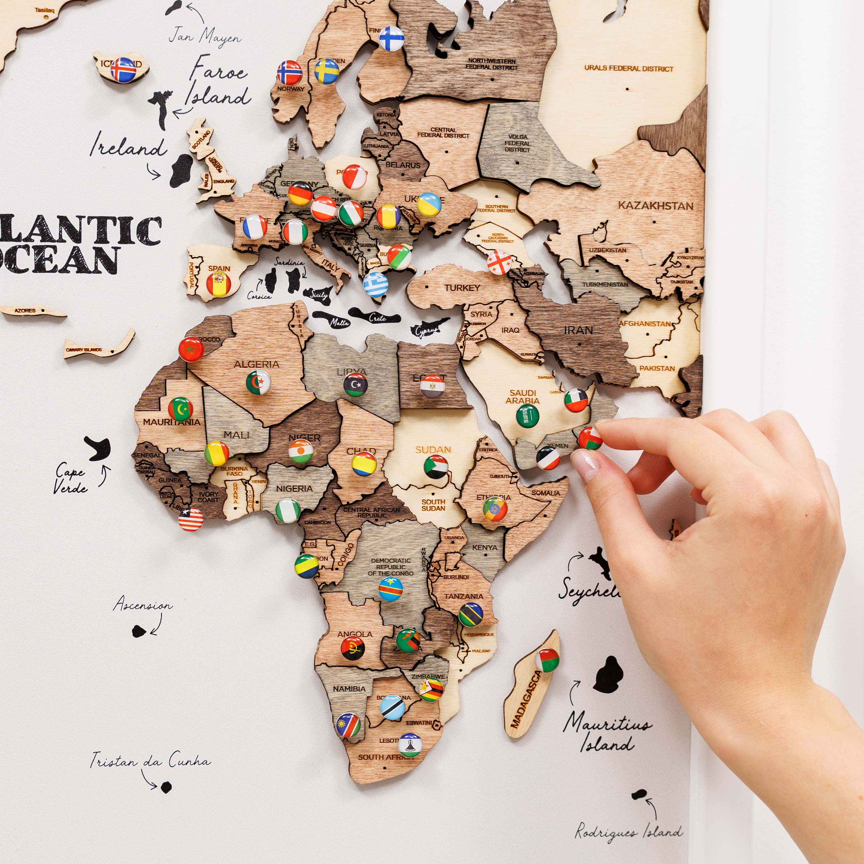 Wooden triptych wall art featuring a smoky finish, showcasing a detailed wooden world map by Enjoy The Wood.