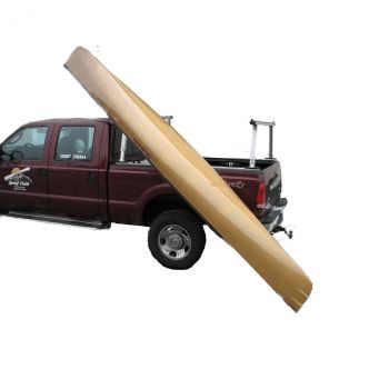 Backcountry Sportsman Tuff Truck Rack with loading bars mounted on a Toyota Tacoma pickup truck in a spring creek setting.