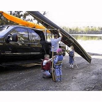 Backcountry Sportsman Tuff Truck Rack with loading bars installed on a Toyota Tacoma, showing durable steel construction and secure mounting.