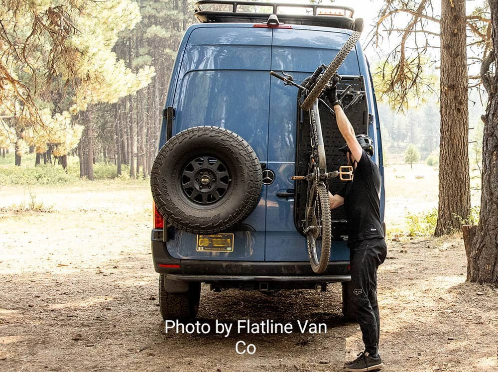 Lolo Racks rear ladder bike rack kit with mounted bikes on sprinter van, durable metal frame for secure transportation.