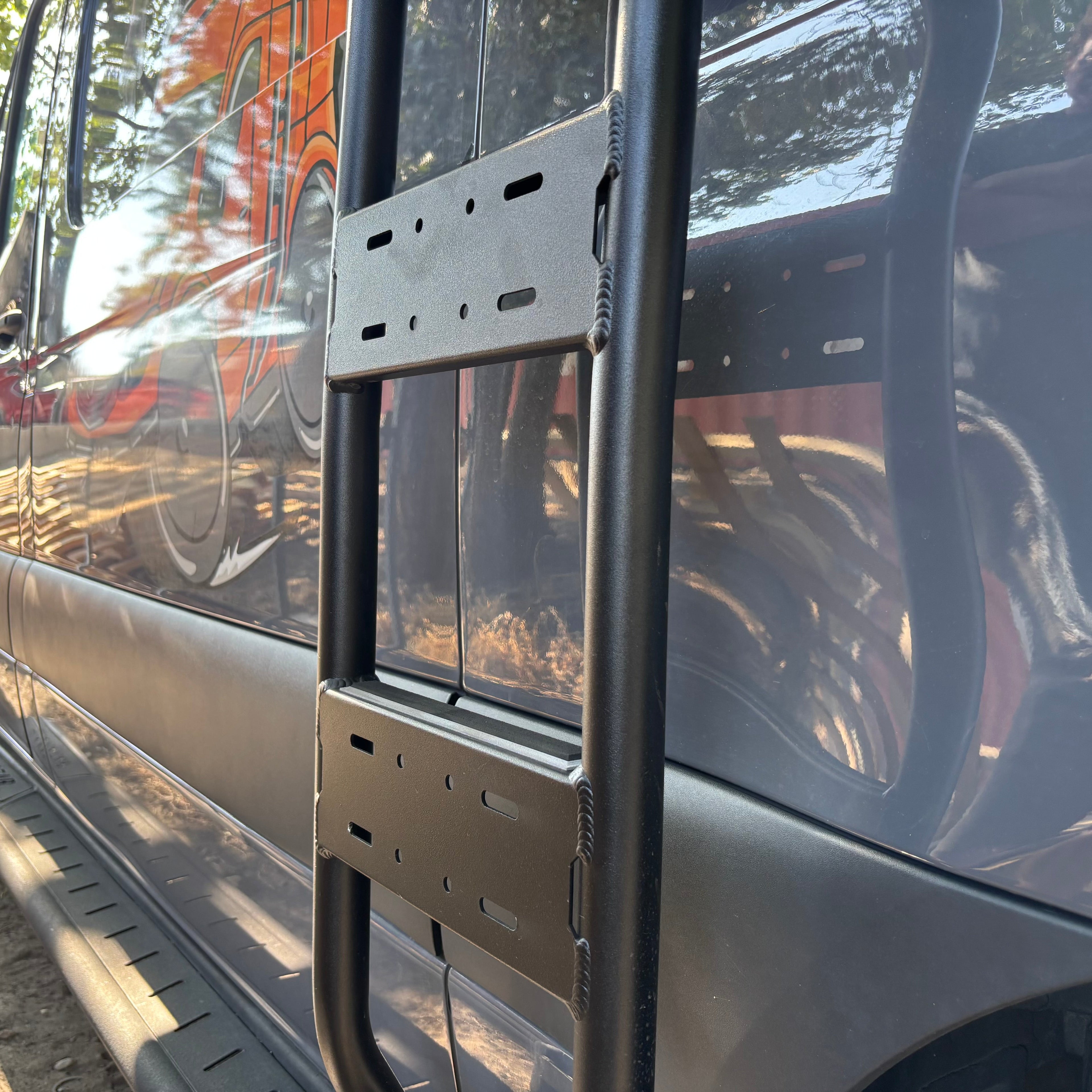 Mercedes Sprinter Van side ladder by Avatar Offroad, sturdy aluminum ladder mounted on the van's side for easy roof access.