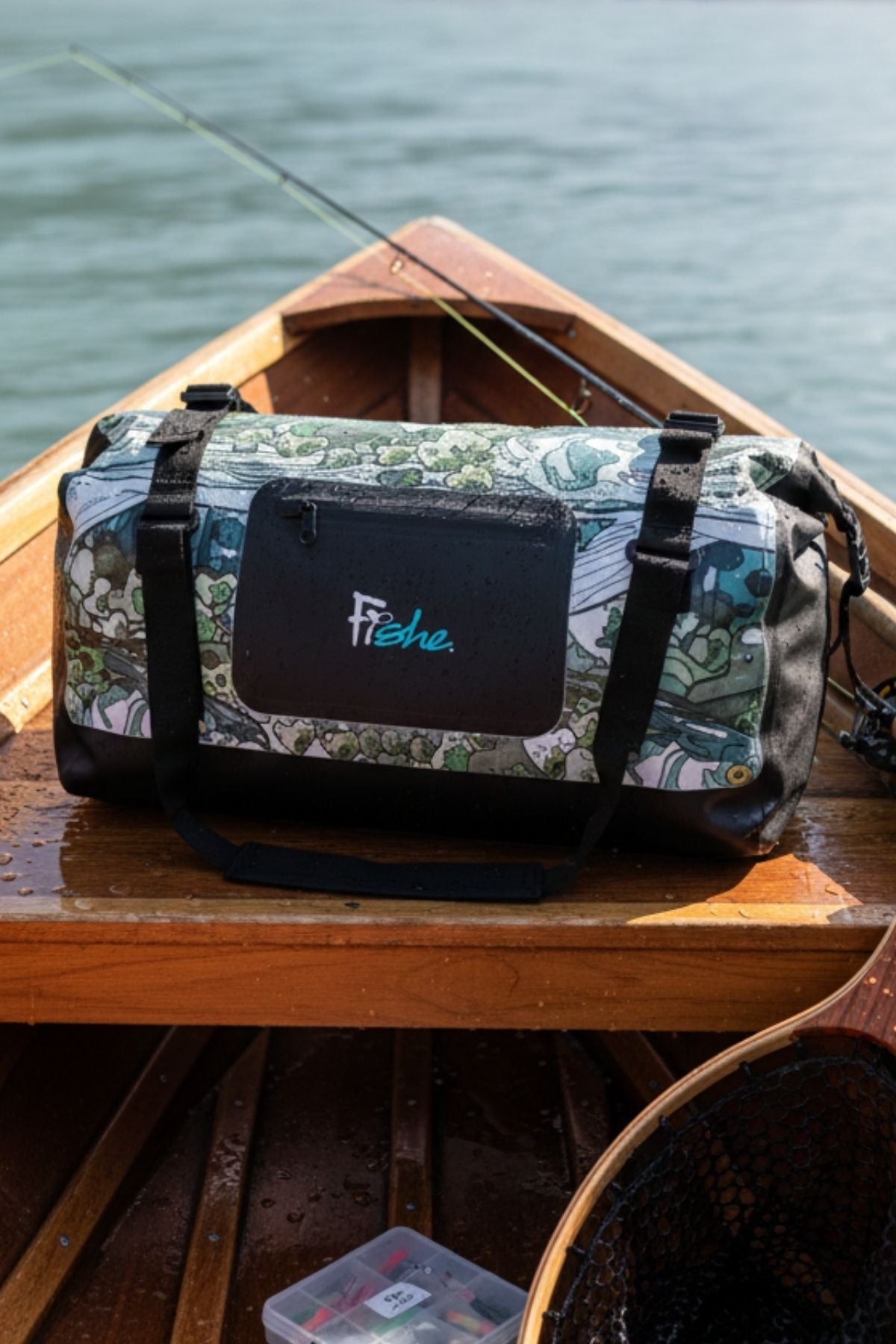 FisheWear Steel My Heart Duffel Dry Bag in durable waterproof fabric, shown with roll-top closure and adjustable shoulder strap.