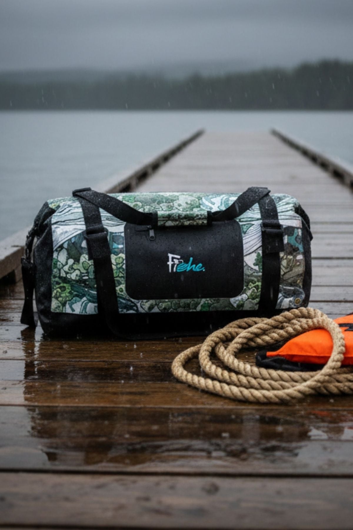 FisheWear Steel My Heart Duffel Dry Bag shown with durable waterproof material and adjustable straps for outdoor adventures.