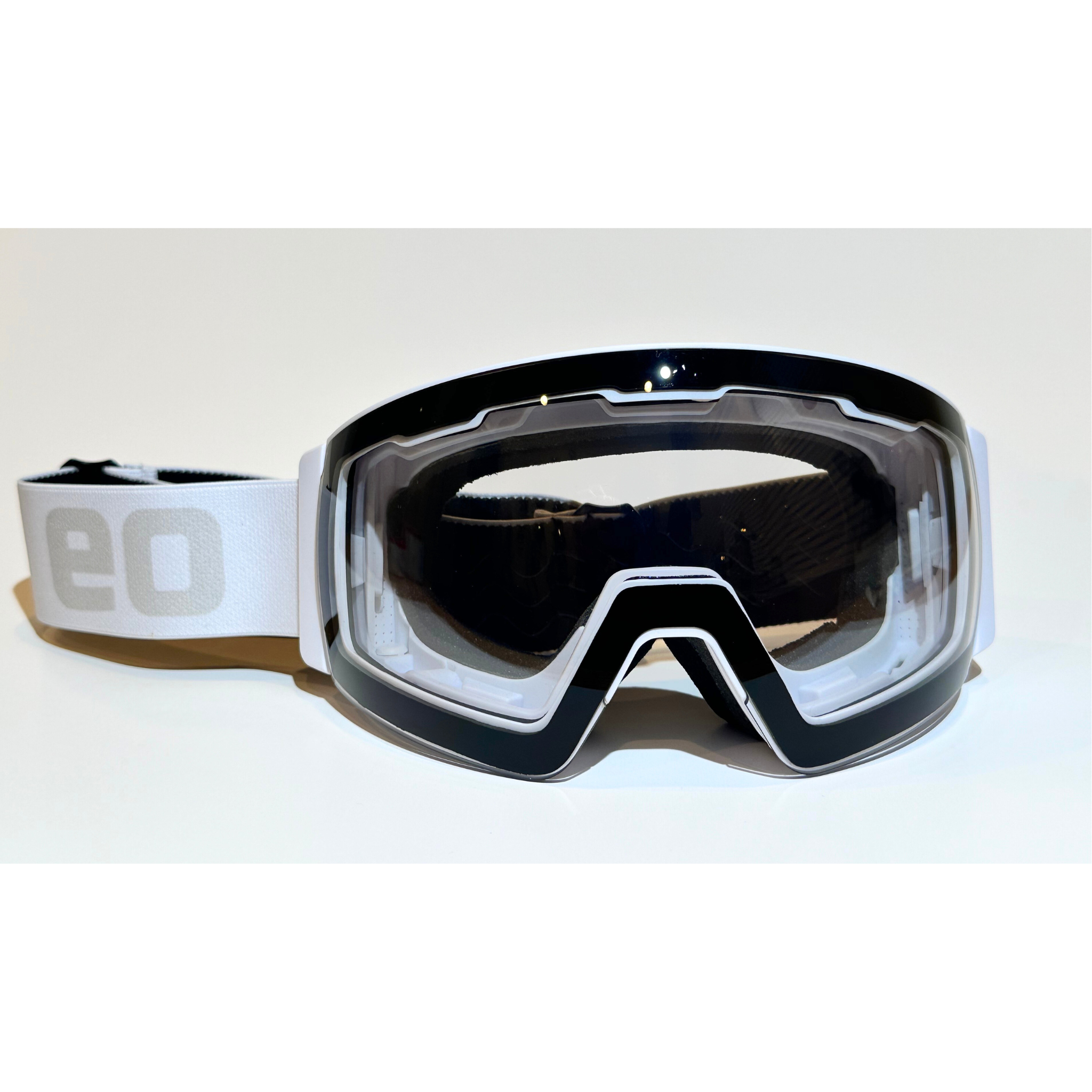 Eastern Outer MACH SCHNELL MAG photochromic ski and snowboard goggles displayed from a straight-on view.