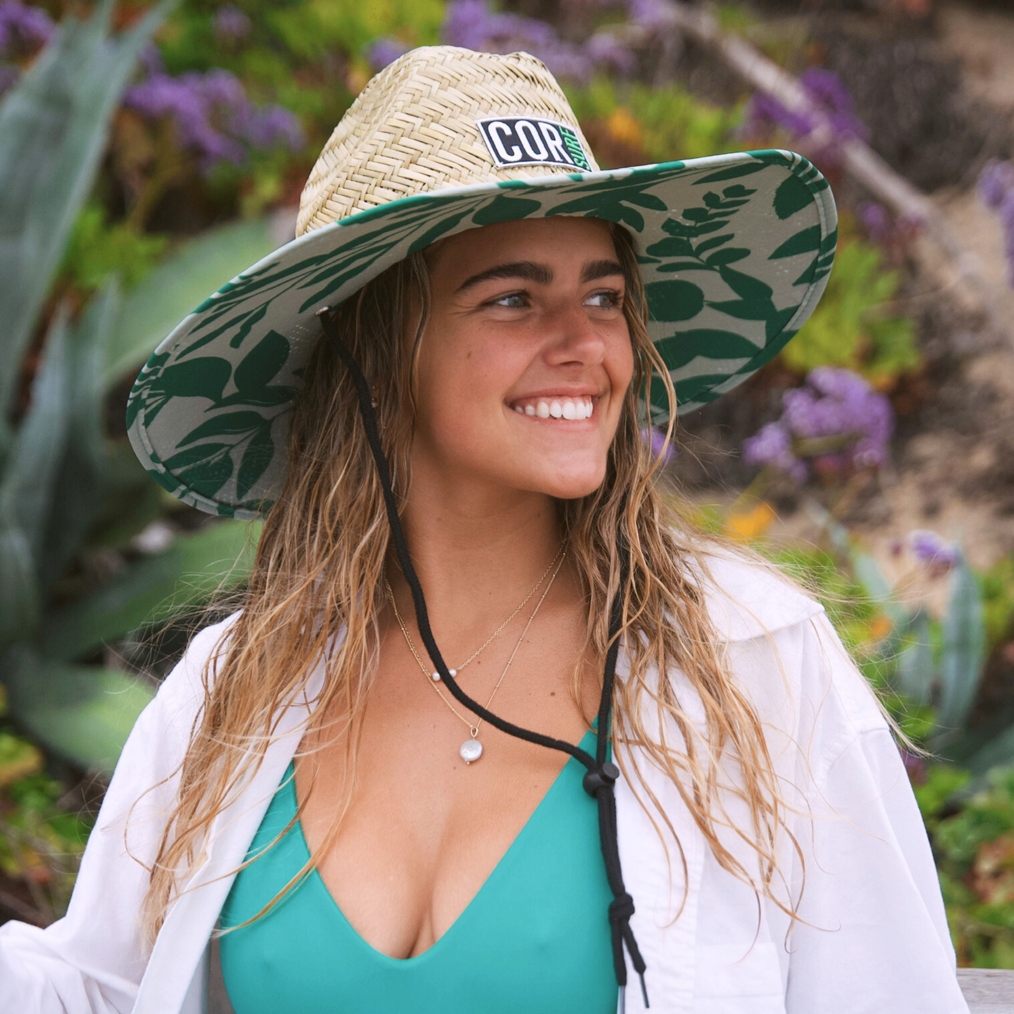 Women's straw beach sun hat by COR Surf, Kailua lifeguard style, perfect for sun protection at the beach.
