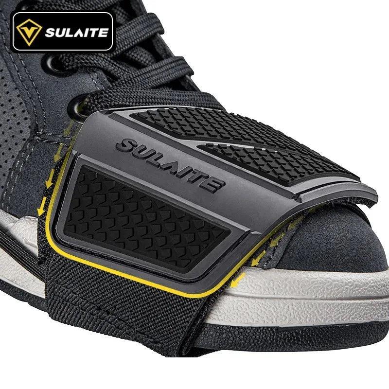 Bean's Moto Booth SULAITE™ motorcycle gear shift pad on black motorcycle boots, providing protection and grip for riding.