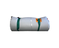 Roll of white material with green straps on a white background