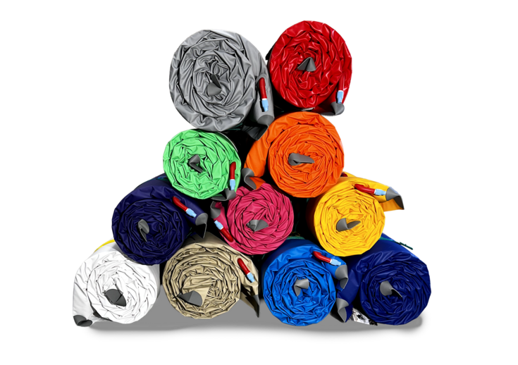 Jack's Plastic Welding Super Paco Pad stacked in a pile, showcasing its durable and comfortable sleeping surface.