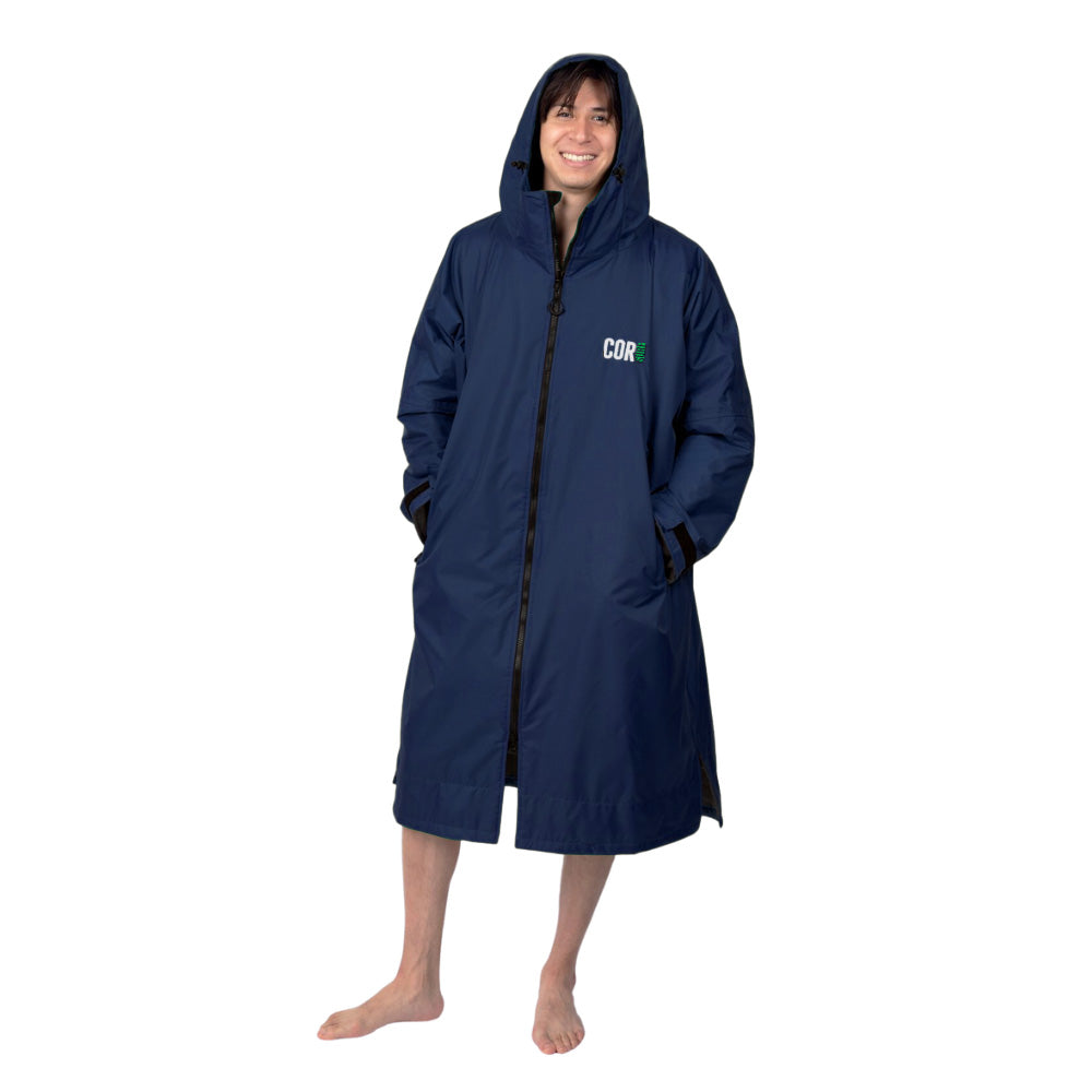 Navy blue COR Surf waterproof swim parka for men with a large hood, designed for outdoor water activities and protection.