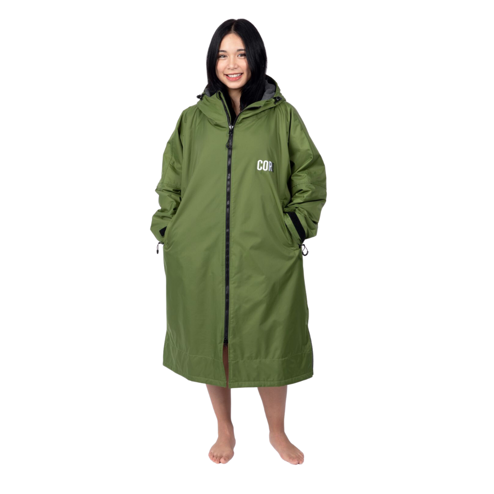 COR Surf waterproof swim parka jacket in green for women and men, lightweight and protective for water activities.