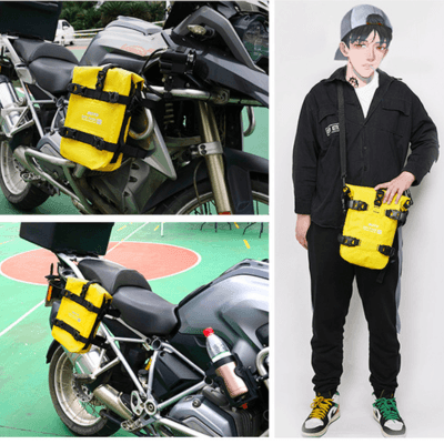TACX™ 2-in-1 waterproof bumper bag attached to motorcycle crash bar, designed for durable storage on Bean's Moto Booth bike.