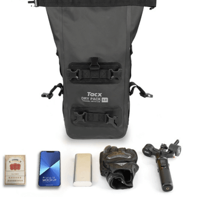 TACX™ 2-in-1 waterproof bumper bag for motorcycle crash bars, durable and compact, shown attached to a motorcycle.