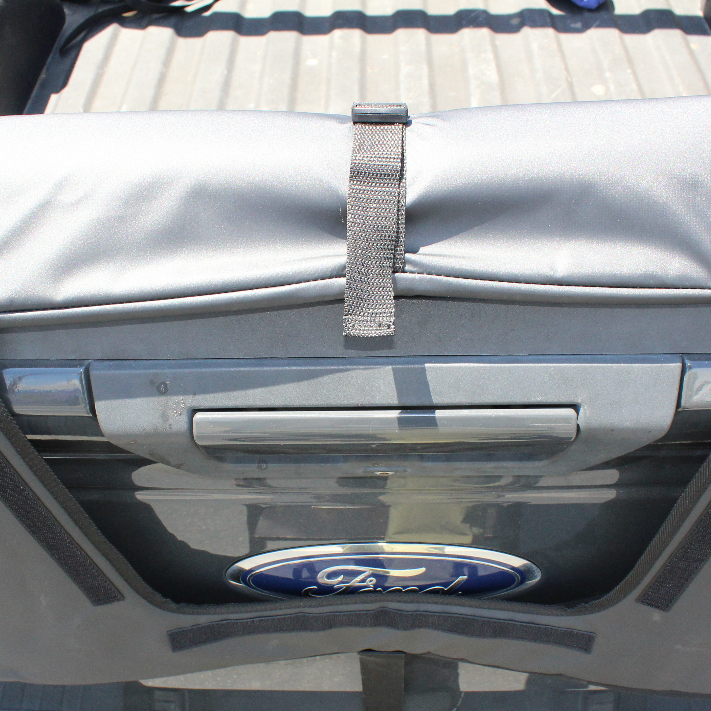 COR Surf tailgate pad with straps for bikes and surfboards, featuring a flap opening for secure transport.