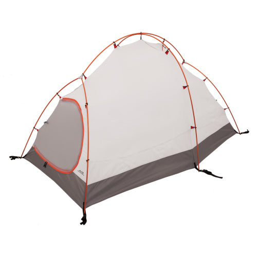 Backcountry Sportsman Tasmanian 3-person mountaineering ground tent in orange and gray, set up outdoors with rainfly and mesh windows.