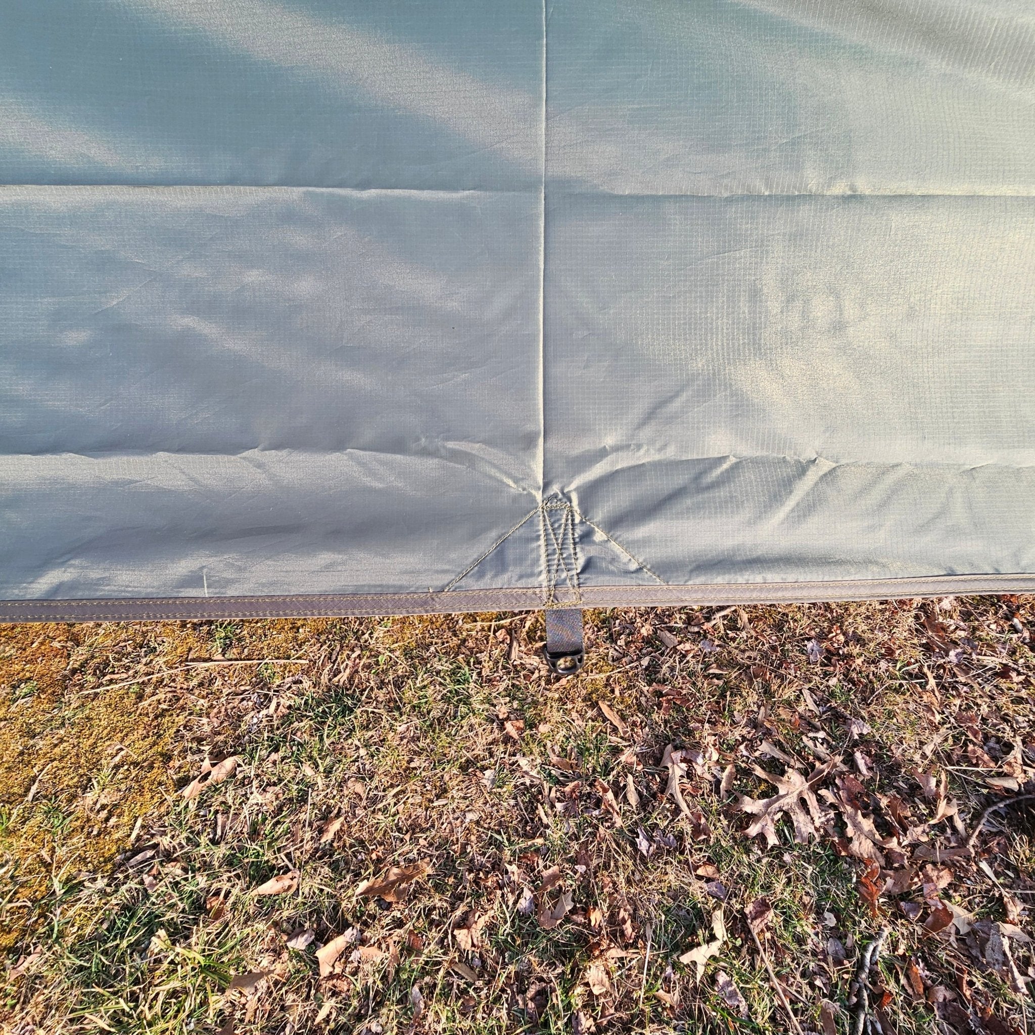 Waterproof 11-foot hammock tarp from Hanging High Hammocks, providing great coverage for hammock camping and outdoor adventures.