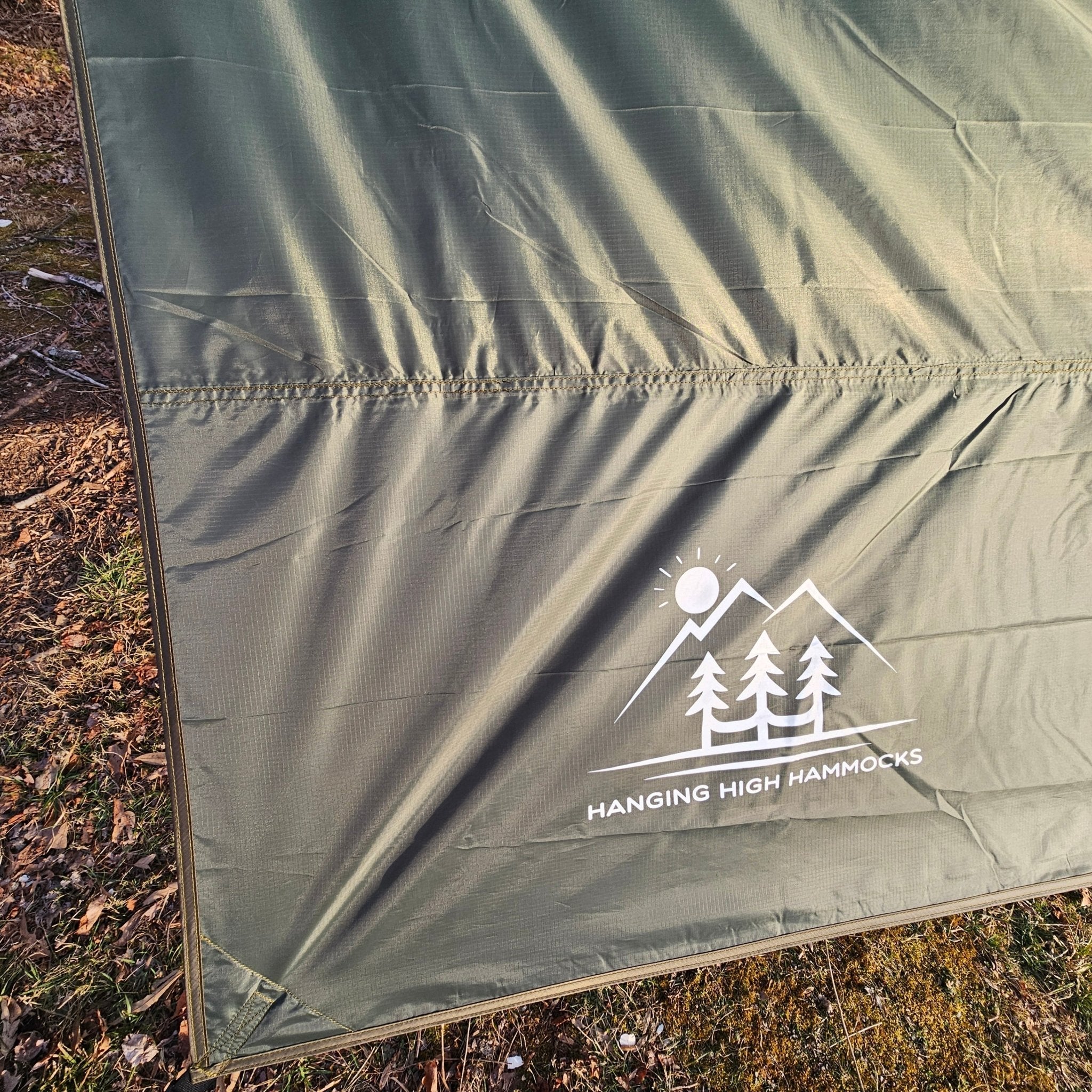 Waterproof 11-foot hammock tarp by Hanging High Hammocks, providing great coverage for hammock camping and outdoor adventures.