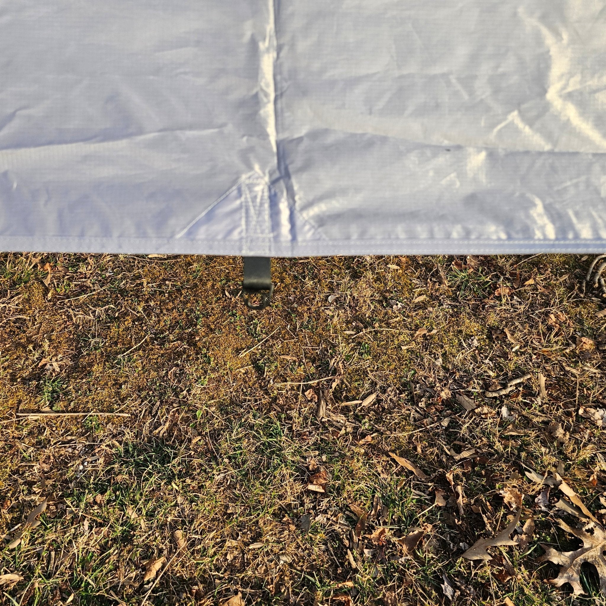 Waterproof 11-foot hammock tarp by Hanging High Hammocks, providing durable coverage for hammock camping.