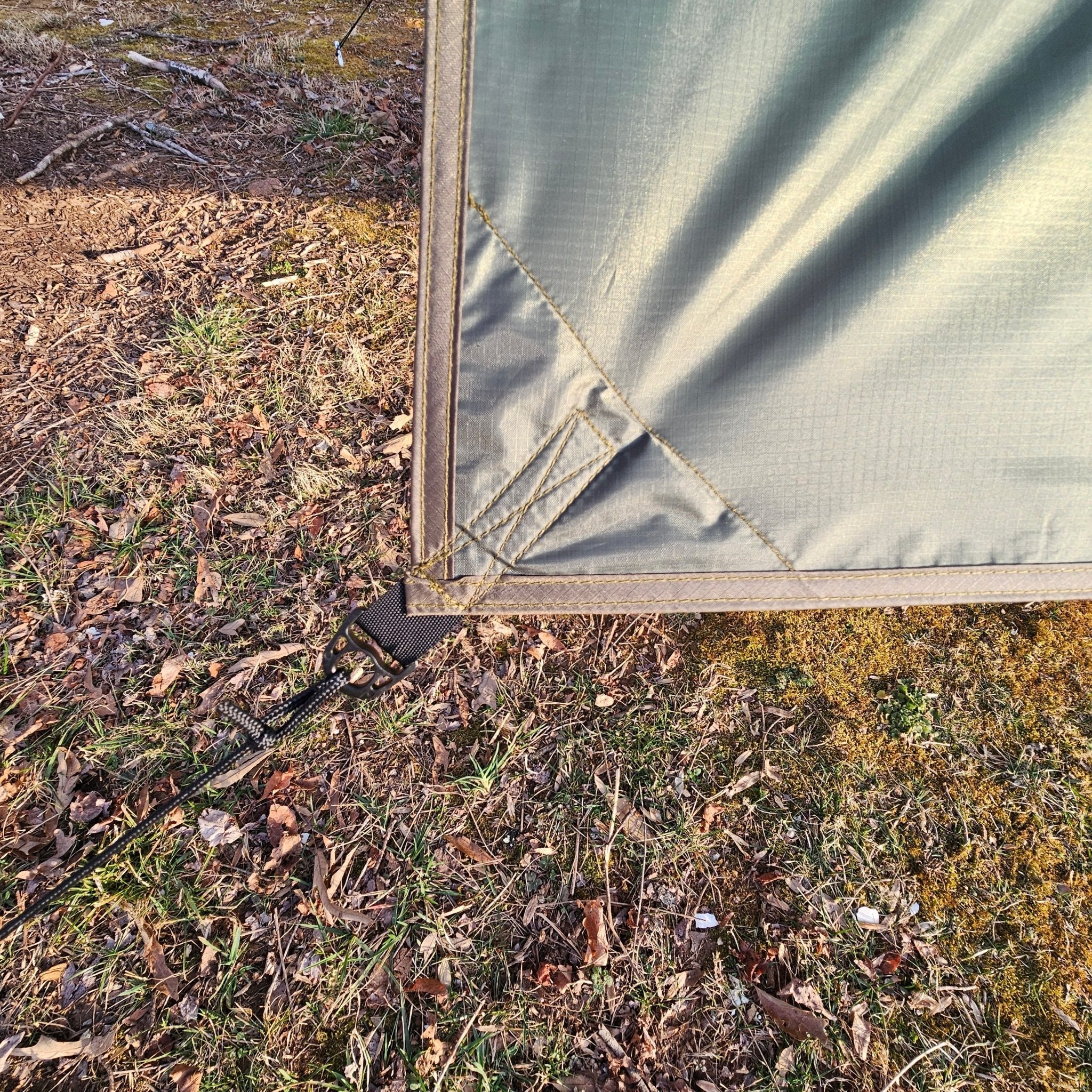 Waterproof 11-foot hammock tarp by Hanging High Hammocks, providing great coverage for hammock camping.
