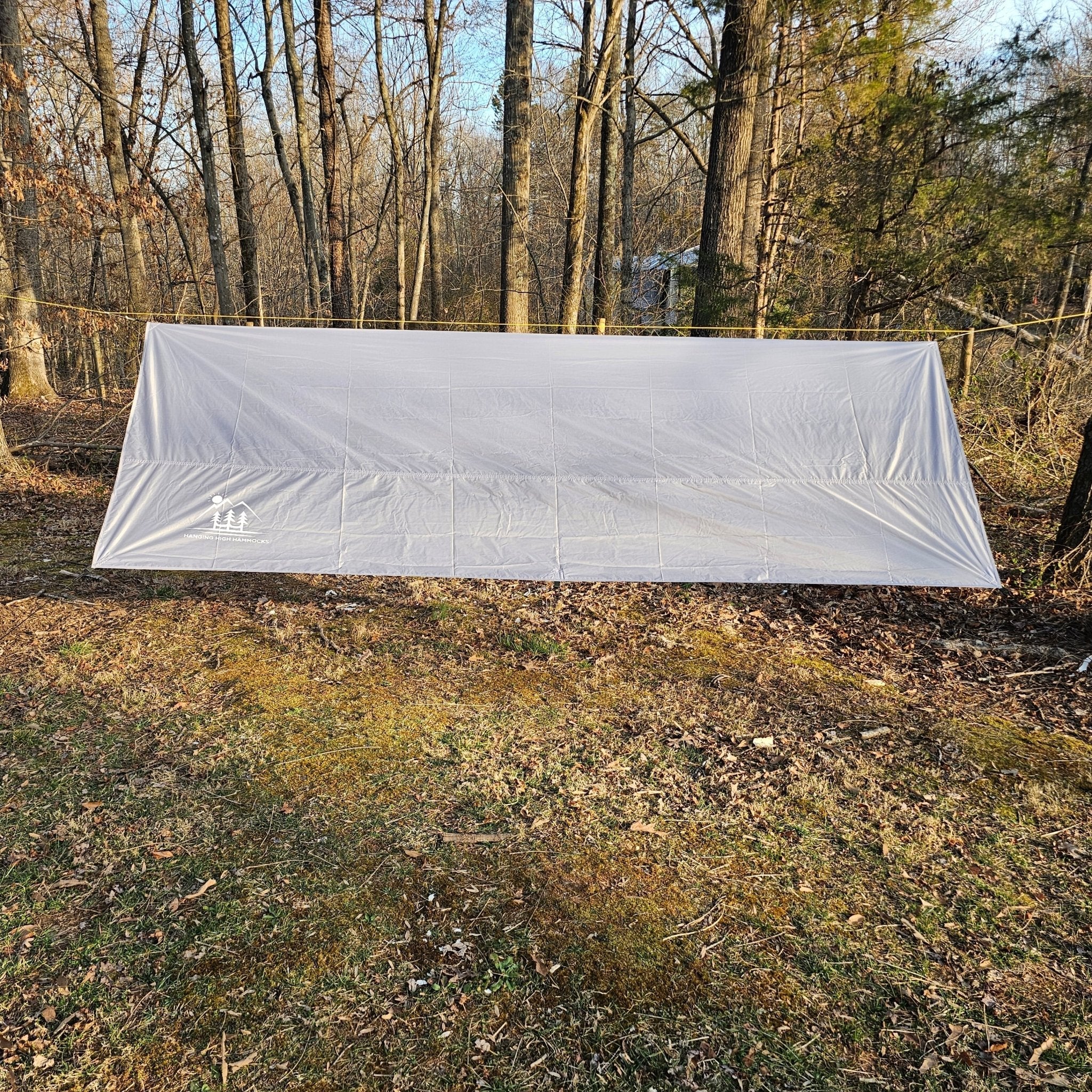 Waterproof 11-foot hammock tarp from Hanging High Hammocks, providing durable cover for hammock camping adventures.