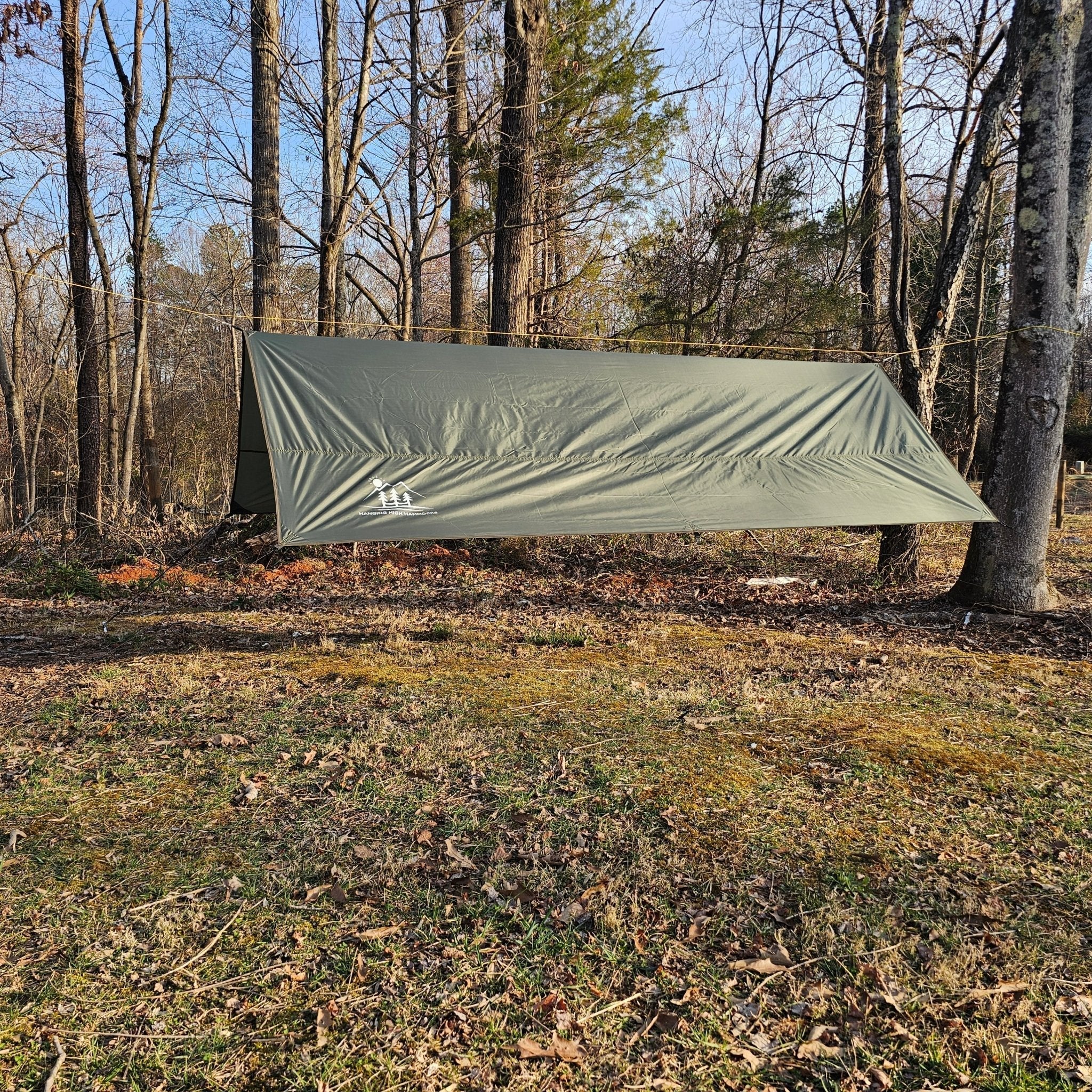 Waterproof 11-foot hammock tarp by Hanging High Hammocks, offers durable coverage for hammock camping.