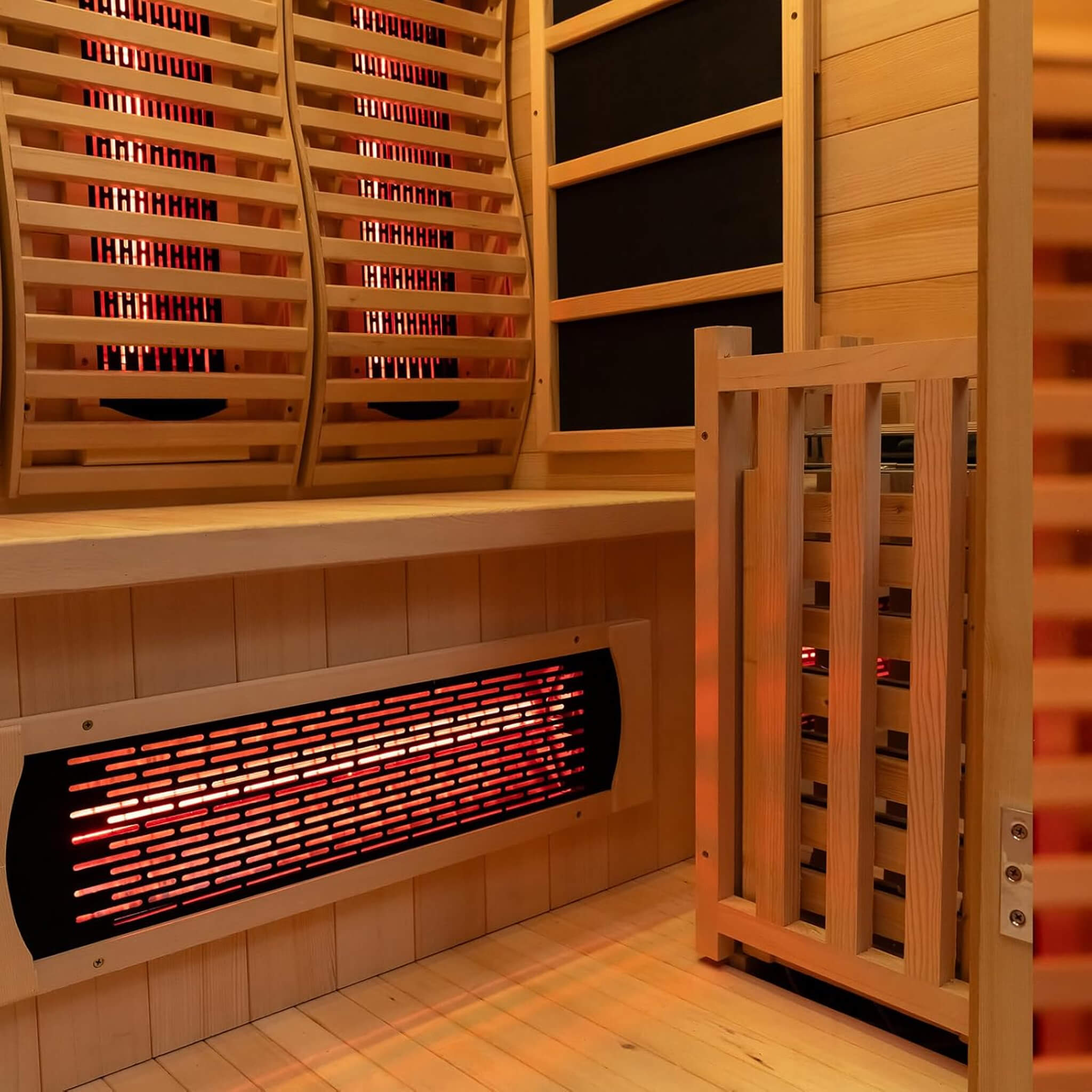 Rövia Luma 2-person indoor sauna with infrared and steam heater, featuring a sleek interior and infrared heater at the bottom.