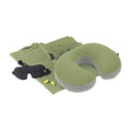 Travel pillow, eye mask, and earplugs on a white background